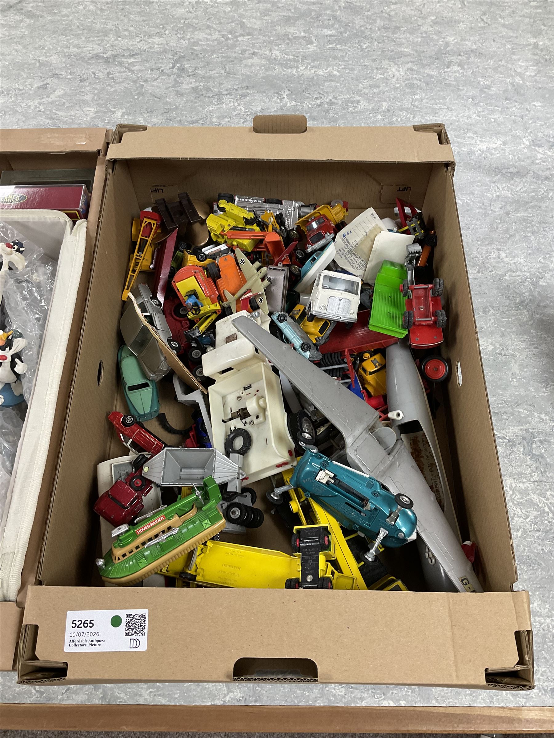 Large collection of toy vehicles including Great British Classics London 2012 Olympics Bus, Matchbox Battle Kings K105 Hover Raider and Dinky Toys Joe's Car 102, together with a collection of Disney figurine ornaments, variously boxed
