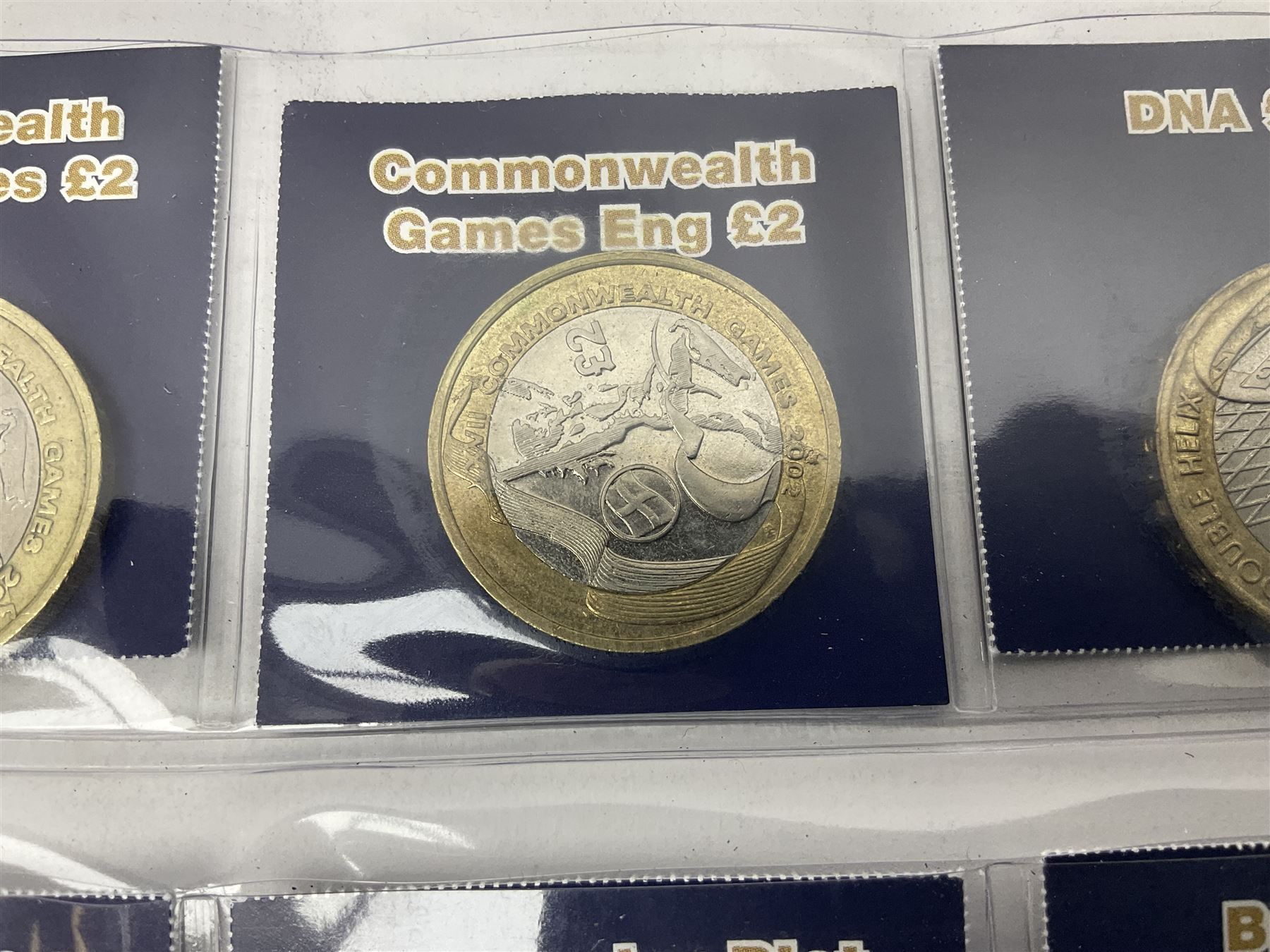 Mostly United Kingdom Queen Elizabeth II commemorative two pound  coins, including 2017 'Jane Austen', 2018 'Sea King', 2018 'Vulcan' etc face value of UK coins approximately 98 GBP