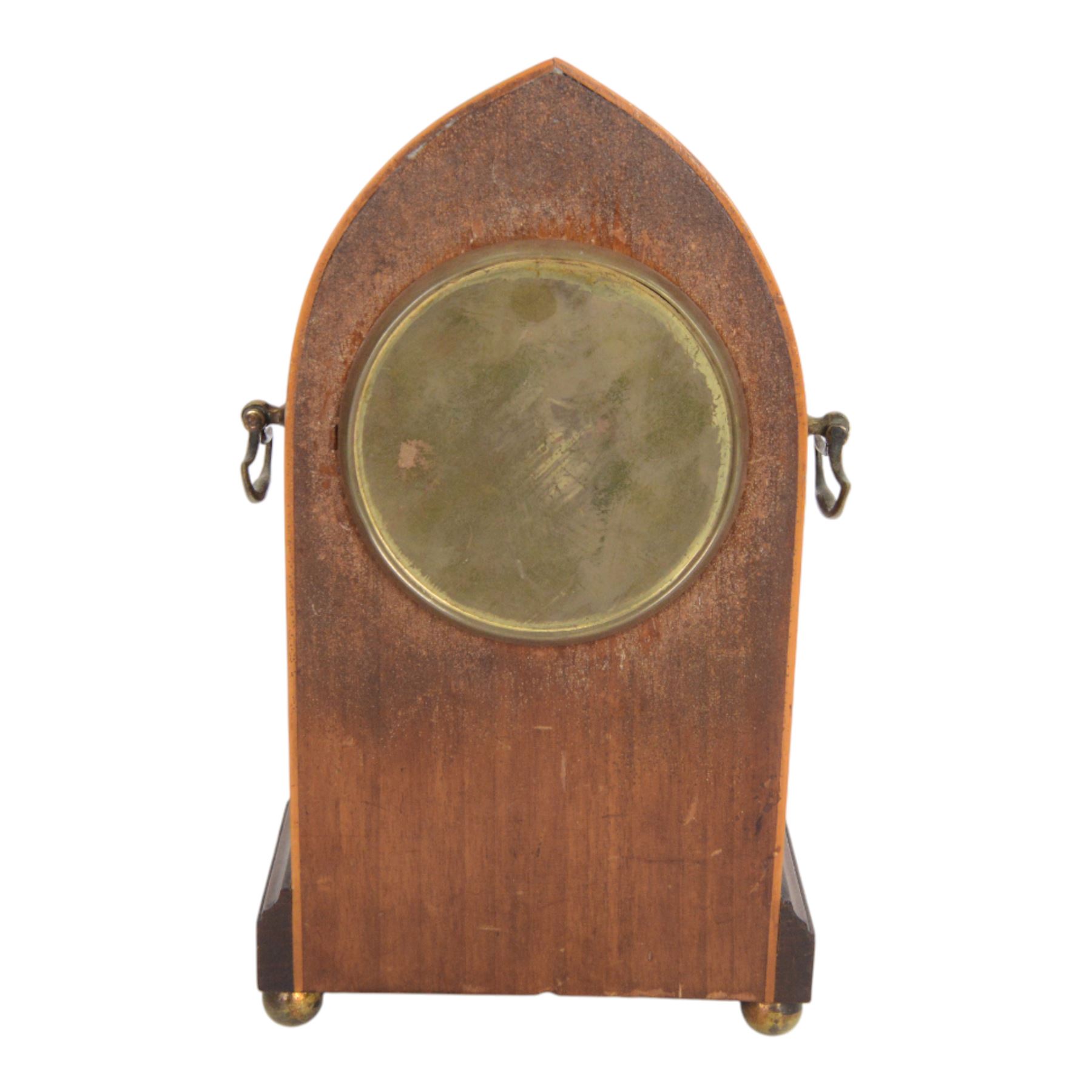 Edwardian painted mahogany lancet clock, arched case with brass side handles, 8-day movement stamped with Richard & Co logo and brass back cover, enamelled dial with Roman chapters, brass hands, glass bezel, arched case with brass side handles on brass bun feet, dial chipped, with winding key 