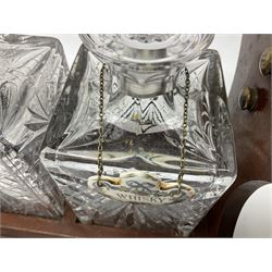 Late 20th century mahogany and silver plated two cut glass decanter tantalus, marked PB&S, with Whisky and Gin Crown Staffordshire ceramic decanter labels, H32cm