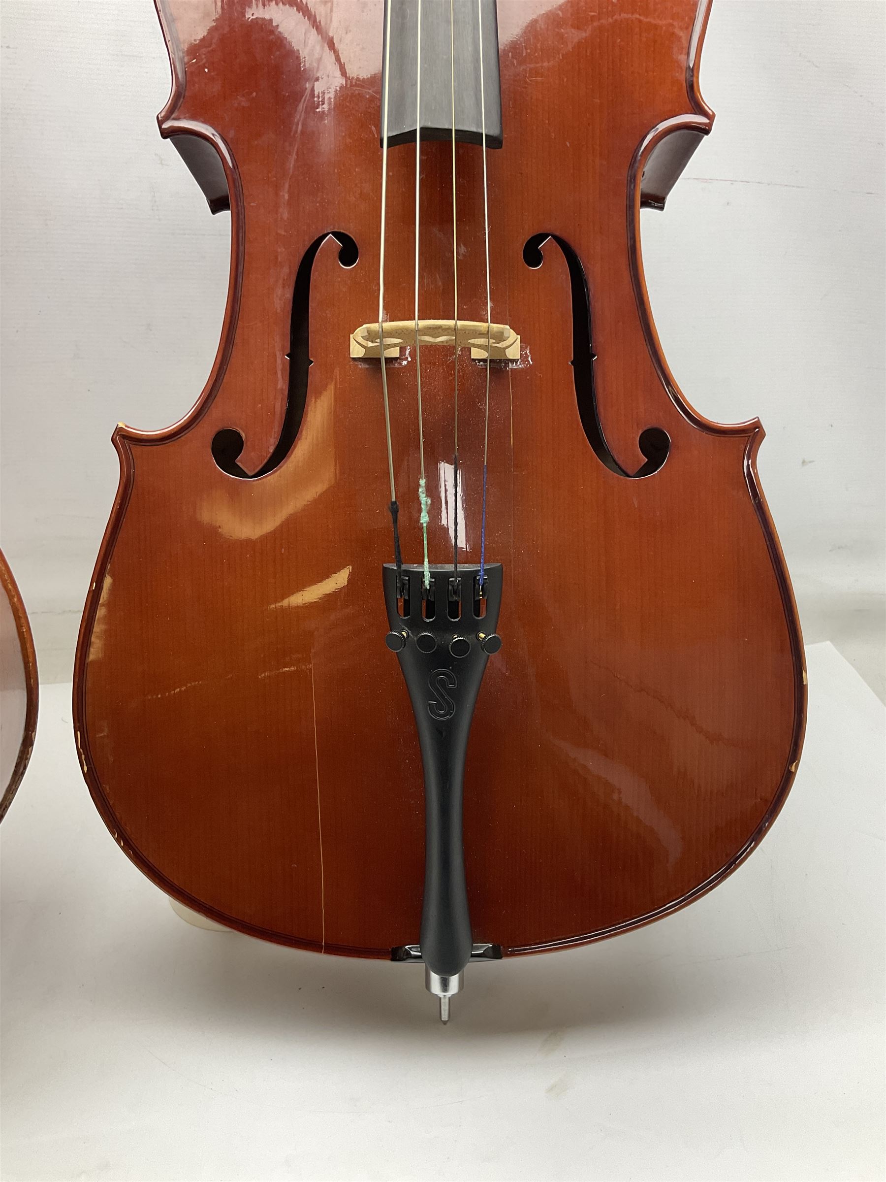 Modern Hungarian half-size cello with 69cm two-piece maple back and ribs and spruce top L114cm overall; and Stentor half size cello bearing label 'The Stentor Student II'; each in soft carrying case (2)