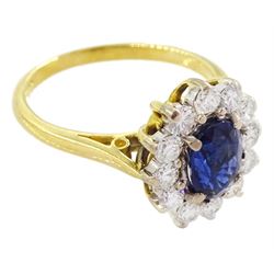 18ct gold oval sapphire and round brilliant cut diamond cluster ring, Birmingham 1994, sapphire approx 1.00 carat, total diamond weight approx 0.70 carat