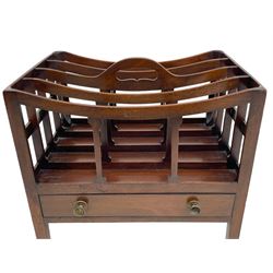 Georgian design mahogany Canterbury, four divisions with dished upper rails, the central rail pierced with handle, fitted with single drawer, on square supports with brass cups and castors 