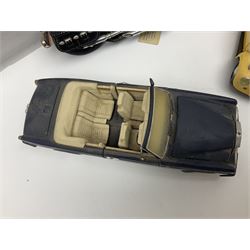 Franklin Mint - three die-cast models comprising 1:10 scale Harley Davidson Heritage Softail motorcycle, 1:24 scale 1957 VW Beetle and 1:24 scale 1993 Rolls Royce Corniche IV; all unboxed (3)