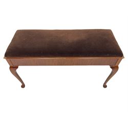 Early 20th century walnut duet piano stool, rectangular hinged lid with upholstered seat, on cabriole supports