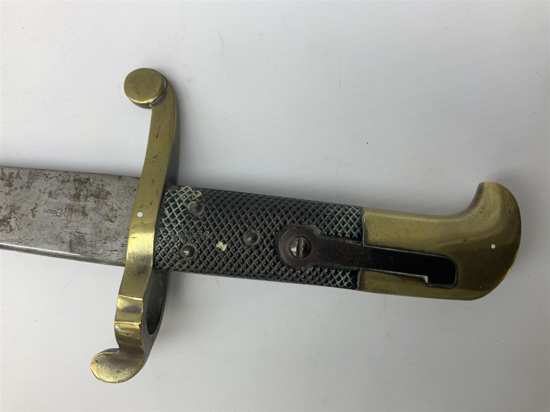 British 1855 pattern 'Sappers & Miners' Lancaster sword bayonet as issued to Medical Corps, the 62cm steel blade marked S&K with various numbers; in brass mounted leather scabbard numbered 1176