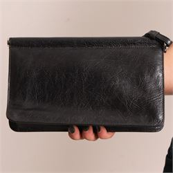 Tod’s - Fashion Pochette Piccola in Nero crinkled patent leather, the rectangular body with rolled-bar top, detachable wrist strap, flap front and silver-tone branded toggle fastening, with original product tag and dust bag