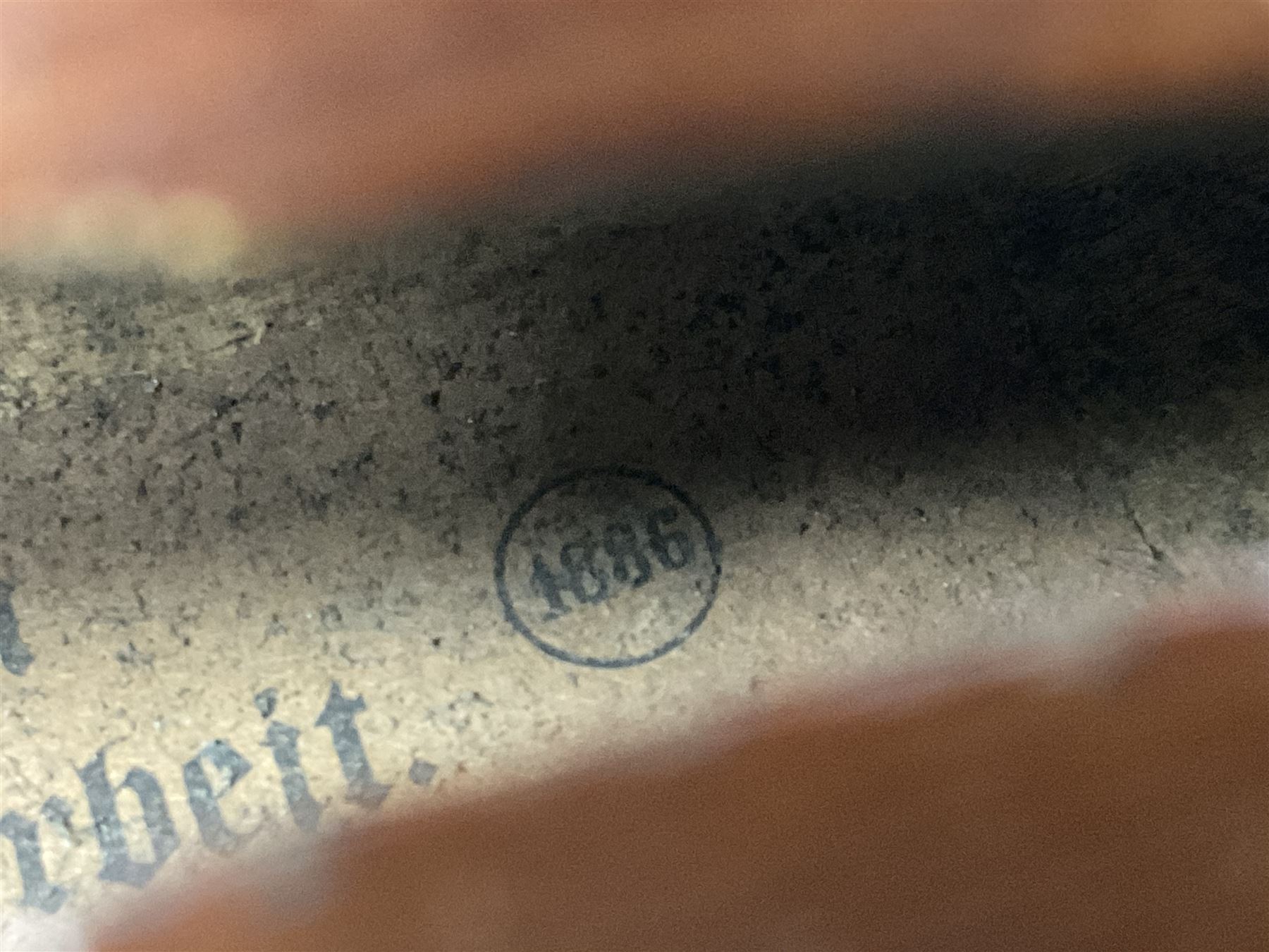 German copy of a Maggini violin c1900 with 35.5cm two-piece maple back and ribs and spruce top, bears label 'Maggini Deutsche Arbeit 1866' L59cm; in carrying case with bow