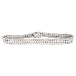 18ct white gold diamond three row bracelet, each four claw set with round brilliant cut diamonds, stamped, total diamond weight approx 7.70 carat