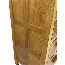Yorkshire Oak - oak chest, fitted with two short over three long drawers, on octagonal feet with castors 