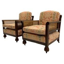Early 20th century walnut framed three piece bergère lounge suite - two seat settee (W162cm), pair armchairs (W73cm)