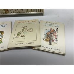 'Peter Rabbit's Book Shelf', containing selection of Beatrix Potter books, mostly library editions, shelf H29cm L27.5cm D11.5cm