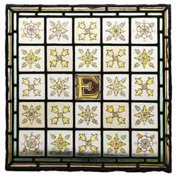 Edwardian stained glass panel, with central painted E motif surrounded by flowers and York...