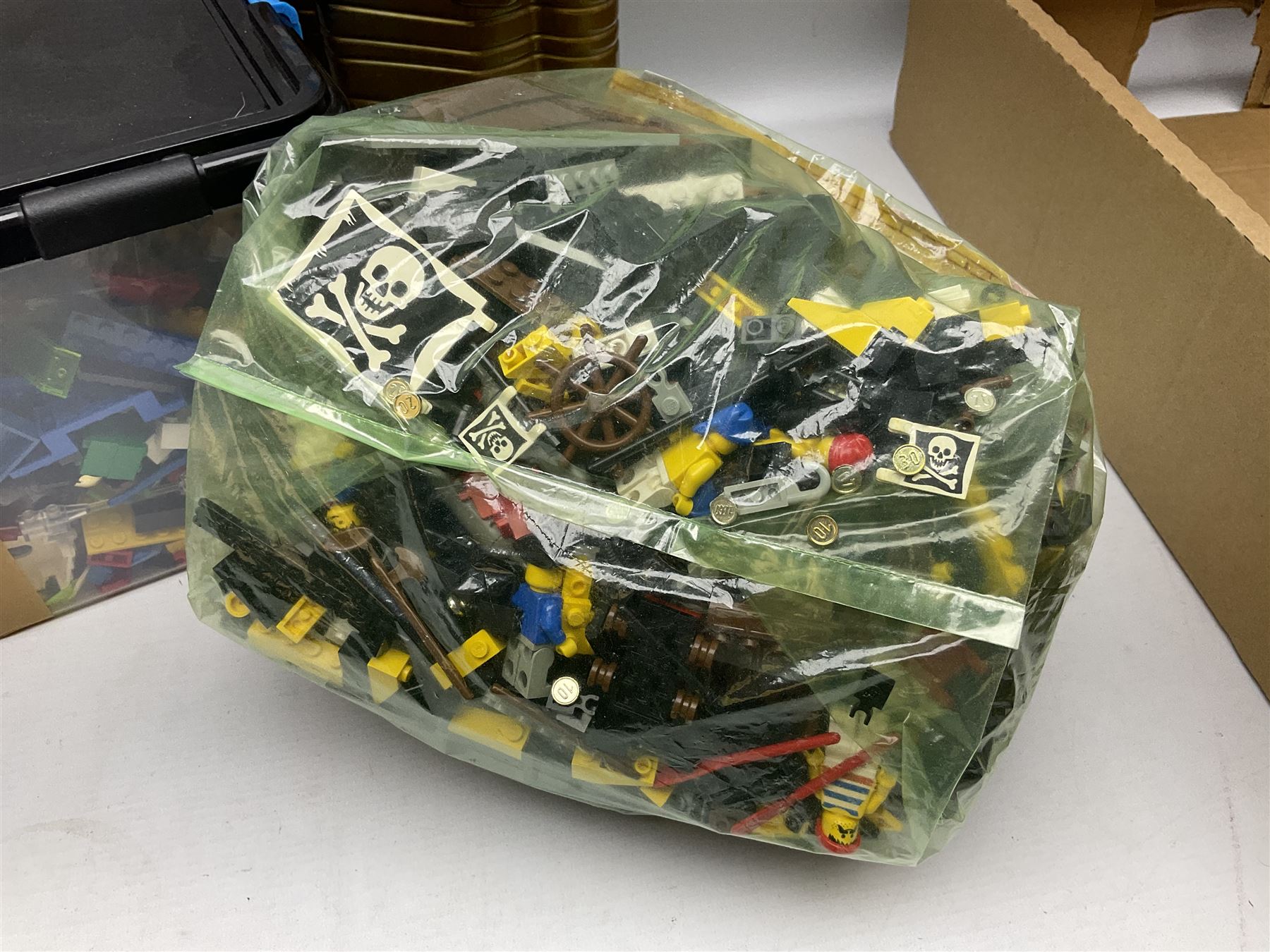Lego - ten kits comprising Harry Potter Magic Mirror 4702; Extreme Team Rocket Car/Plane 6580; two Adventure Egypt Cars 5918; Adventure Egypt Bi-Plane 5928; Adventure Egypt Tombs and Car 5919 in golden Tutankamun box; Castle Knight with Horse & Cart 6016; Castle Witch & Fireplace 2872; Castle Robin Hood Hideout 6054; and Pirate Ship 6285; together with over 3.5kg of loose animals, characters and bricks etc; all unboxed