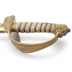 Victorian 1827 pattern Naval officers sword with lions head pommel, wire wound fishskin grip, the brass mounted leather scabbard inscribed 'Galt, Portsmouth', blade length 70cm 