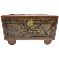 Mid-20th century Singapore camphor wood blanket chest, heavily carved depicting battle scenes and cityscapes 