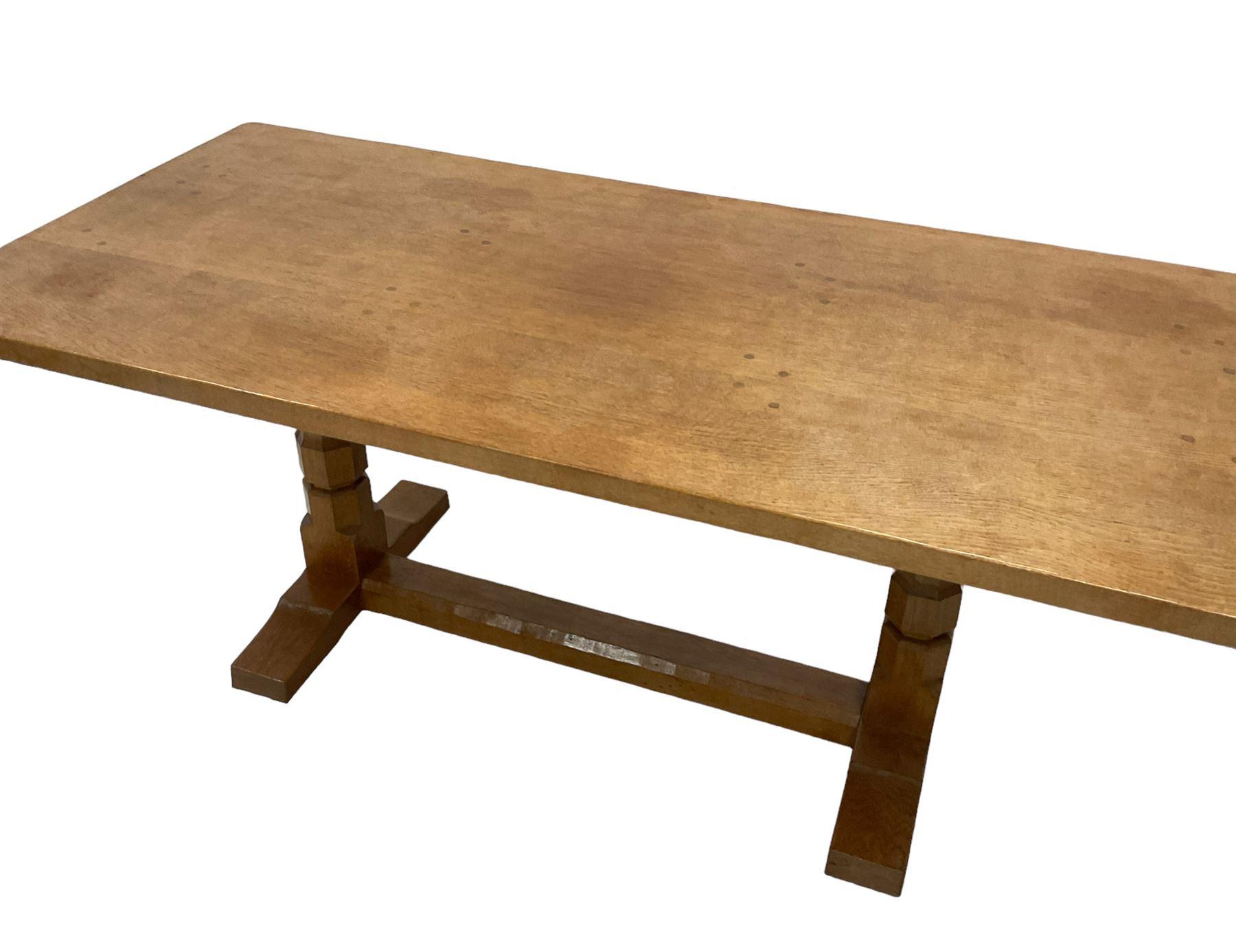 Mouseman - oak 6' refectory dining table, rectangular adzed and pegged top, two octagonal pillar supports on sledge feet joined by floor stretcher,  carved with mouse signature, by the workshop of Robert Thompson, Kilburn