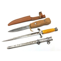  WW2 German Army Officer's dagger, 25.5 cm blade with Original Eickorn Solingen trade mark, swastika removed from scrolled guard, moulded orange celluloid grip with oak leaf pommel and ferrule, in textured scabbard with two hanging loops, L40.5cm and a William Rodgers 'Amphibian' diver's knife 16cm blade with shaped cork handle in sheath, L30cm (2)  