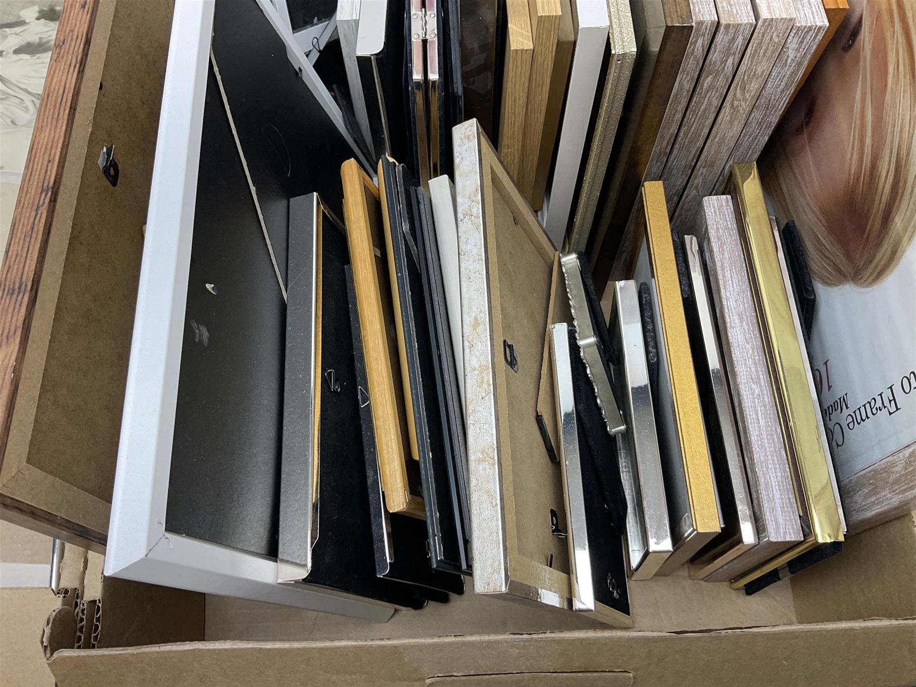 Large quantity of photograph frames, to include wooden, metal, glass and enamel examples, in two boxes 