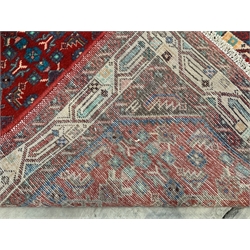 Persian Hamadan red ground runner rug, the field decorated with herati motifs, geometric design border the outer and inner guard, 79cm x 537cm