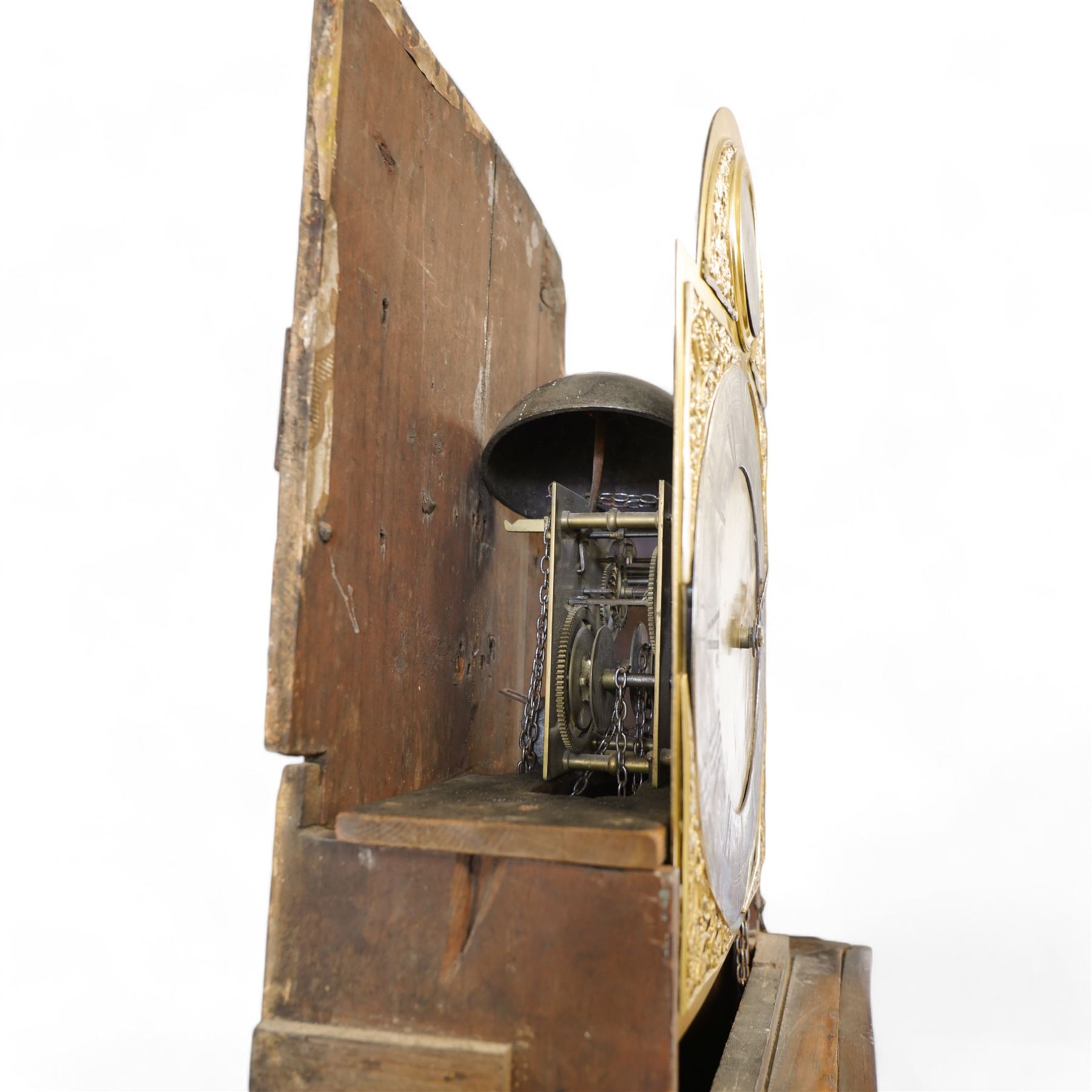 Johnathan Storr of York - 30 hour longcase clock c1770, in a later mahogany case with a decorative swan neck pediment, carved gilded eagle and fretwork, with a dogtooth moulding, break arch hood door and detached pilasters beneath, trunk with a conforming break arch topped door on a square plinth with raised moulding and bracket feet, brass arched dial with makers name to the arch, plain dial centre and silvered chapter ring with Roman numerals, five minute Arabic's, minute track and matching steel hands, chain driven movement with a countwheel strike on a bell. No Pendulum or weight.
Johnathan Storr was an 18th century York clockmaker, working from Petergate and Minster gates in the city centre.