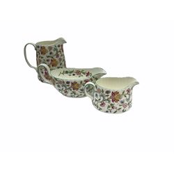 Minton Haddon Hall pattern tea and dinner wares, including basket dish, two covered tureens, six dinner plates, eight dessert plates, twelve tea plates, six soup bowls, six cereal bowls, teapot, coffee pot, milk jug, covered sucrier twelve tea cups and saucers, six mugs, footed bon bon dish, pair of candlestick holders, cake knife and slice etc (81)