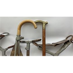 Adjustable Gamebird shooting stick, together with Mills Munitions shooting stick, Featherwate shooting stick, five others and two wooden walking sticks.  