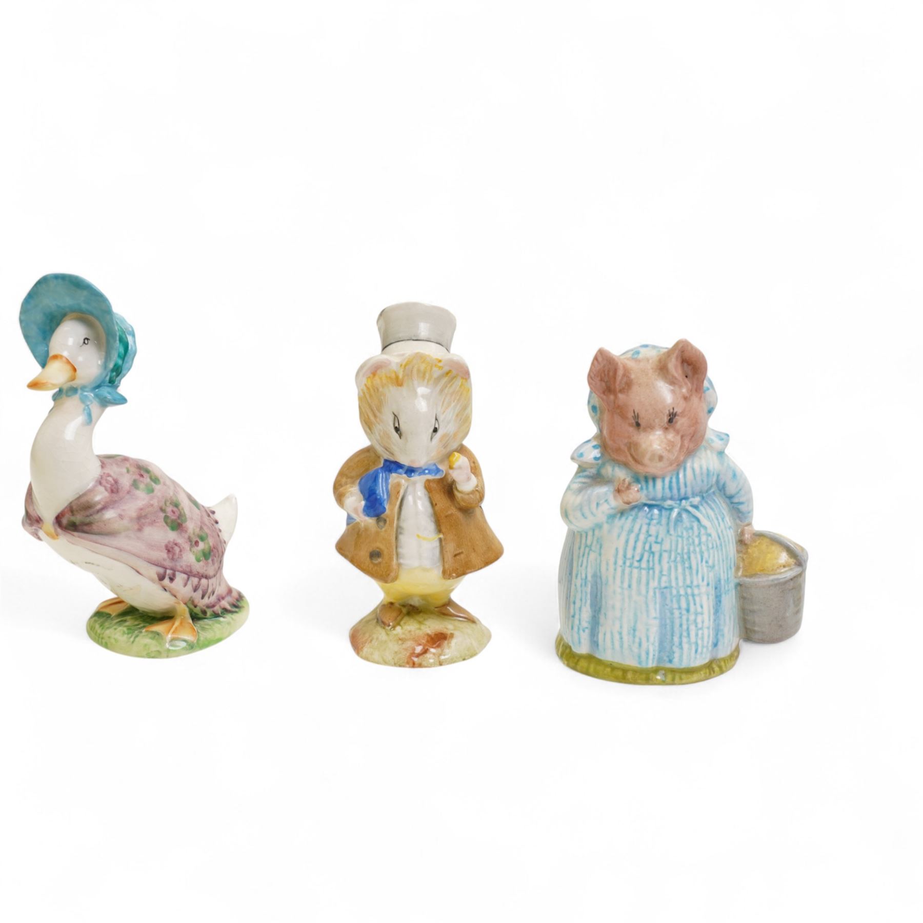 Ten Beswick Beatrix Potter figures, including Aunt Pettitoes, Amiable Guinea Pig, Pickles, Hiding From the Cat etc  