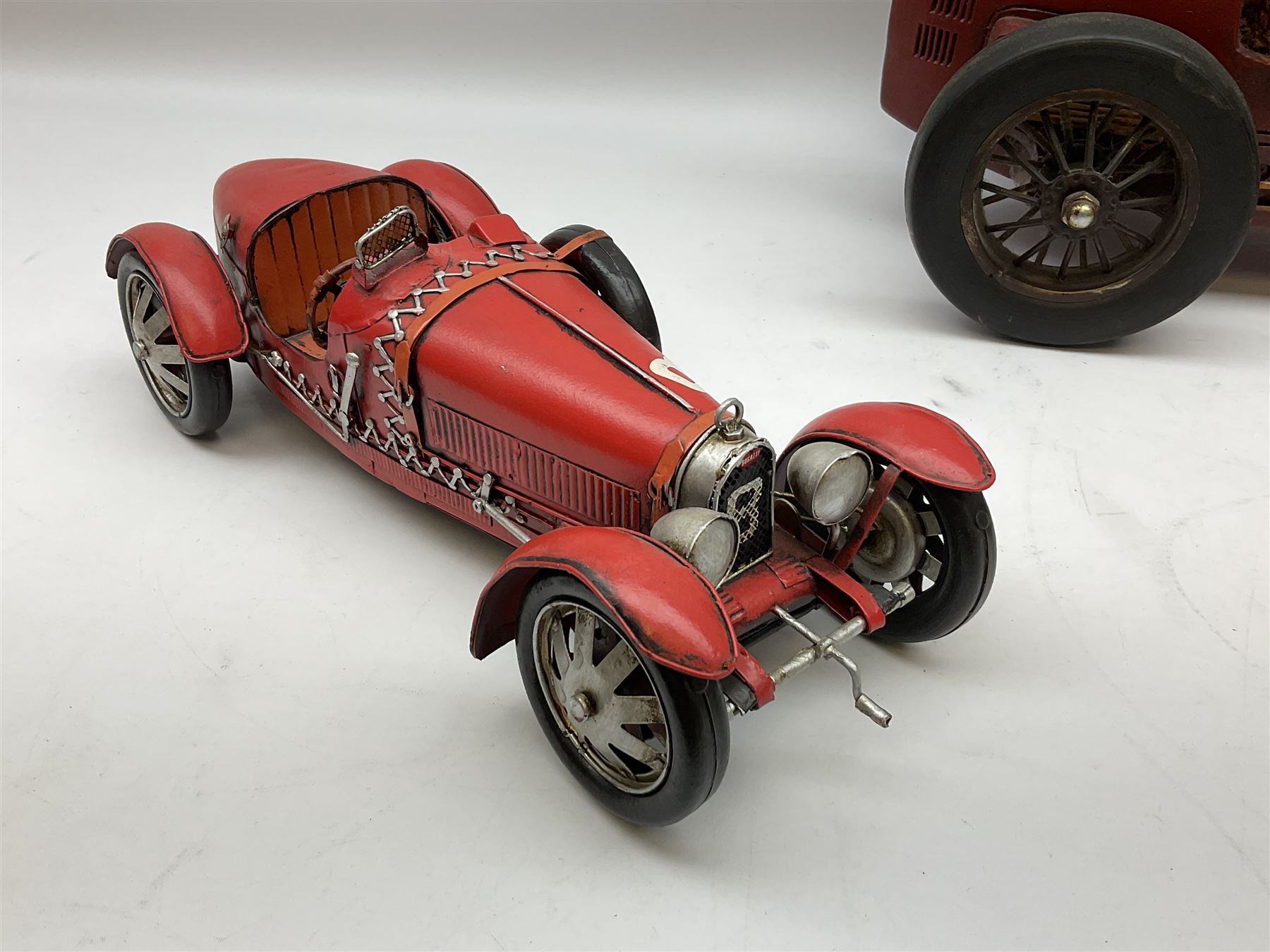 Four Franklin Mint Precision Models, one with hardwood body; large reproduction model of a vintage racing car L52cm; and four other modern metal/wooden models of vintage cars; all unboxed (9)