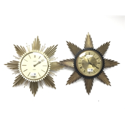  1970's Junghans Electora sunburst electric wall clock, cream dial with baton numerals, D46cm and a similar Metamec wall clock with Roman dial, D47cm (2)   