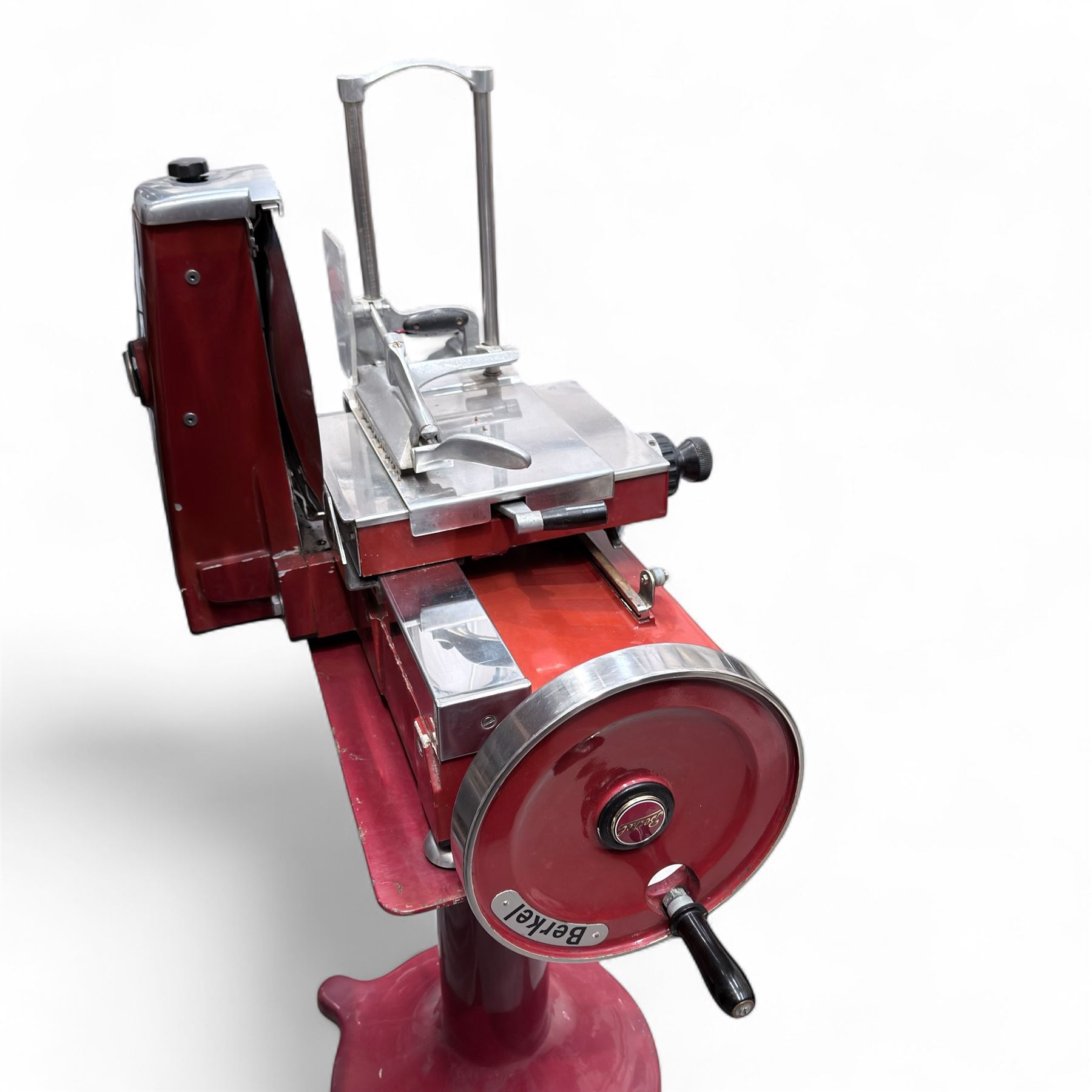 Vintage Berkel 115 NEV meat slicer on pedestal, red finish
