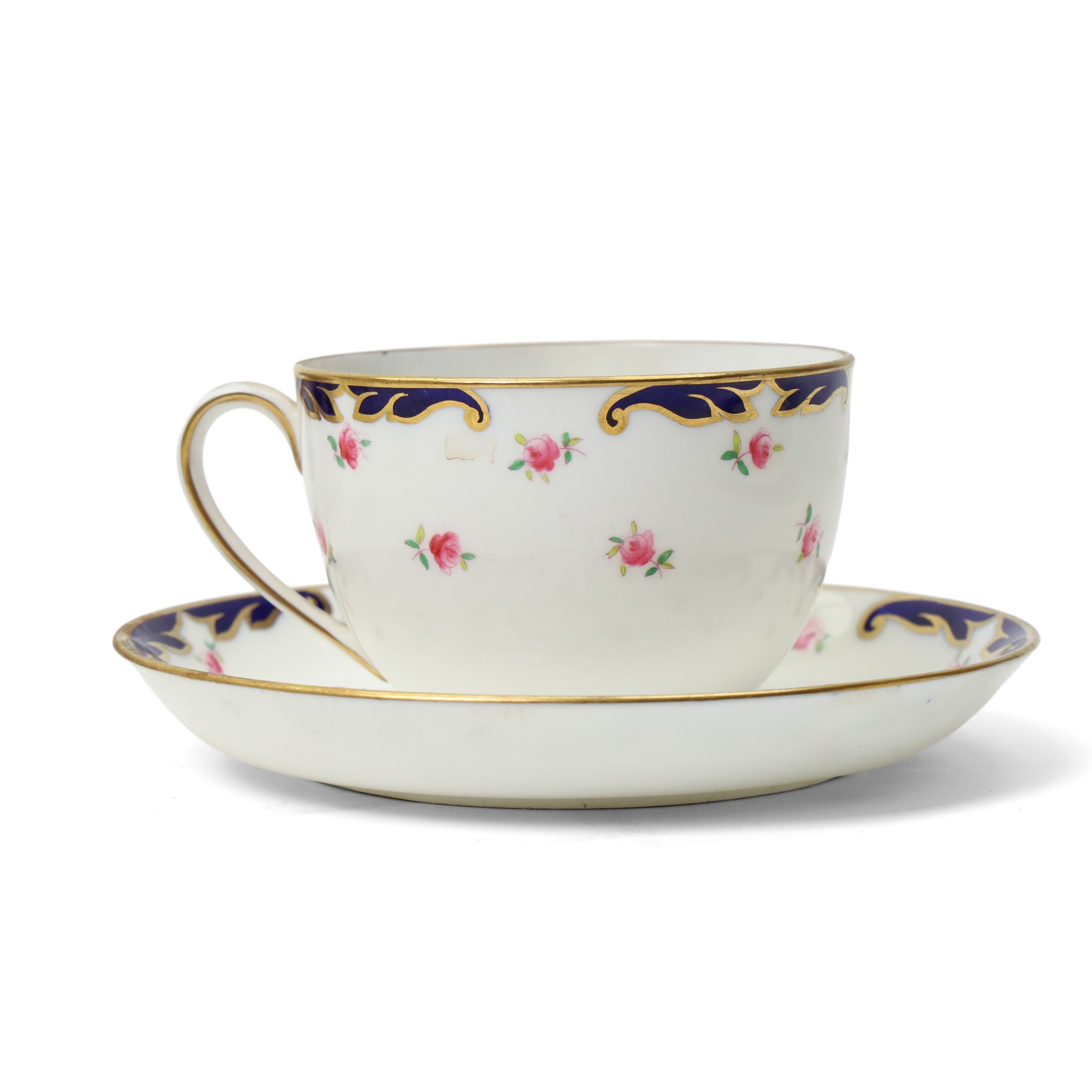 Wedgwood tea service decorated with floral sprays within a blue and gilt border comprising five cups, ten saucers, seven plates, two bread and butter plates, milk jug and sugar bowl