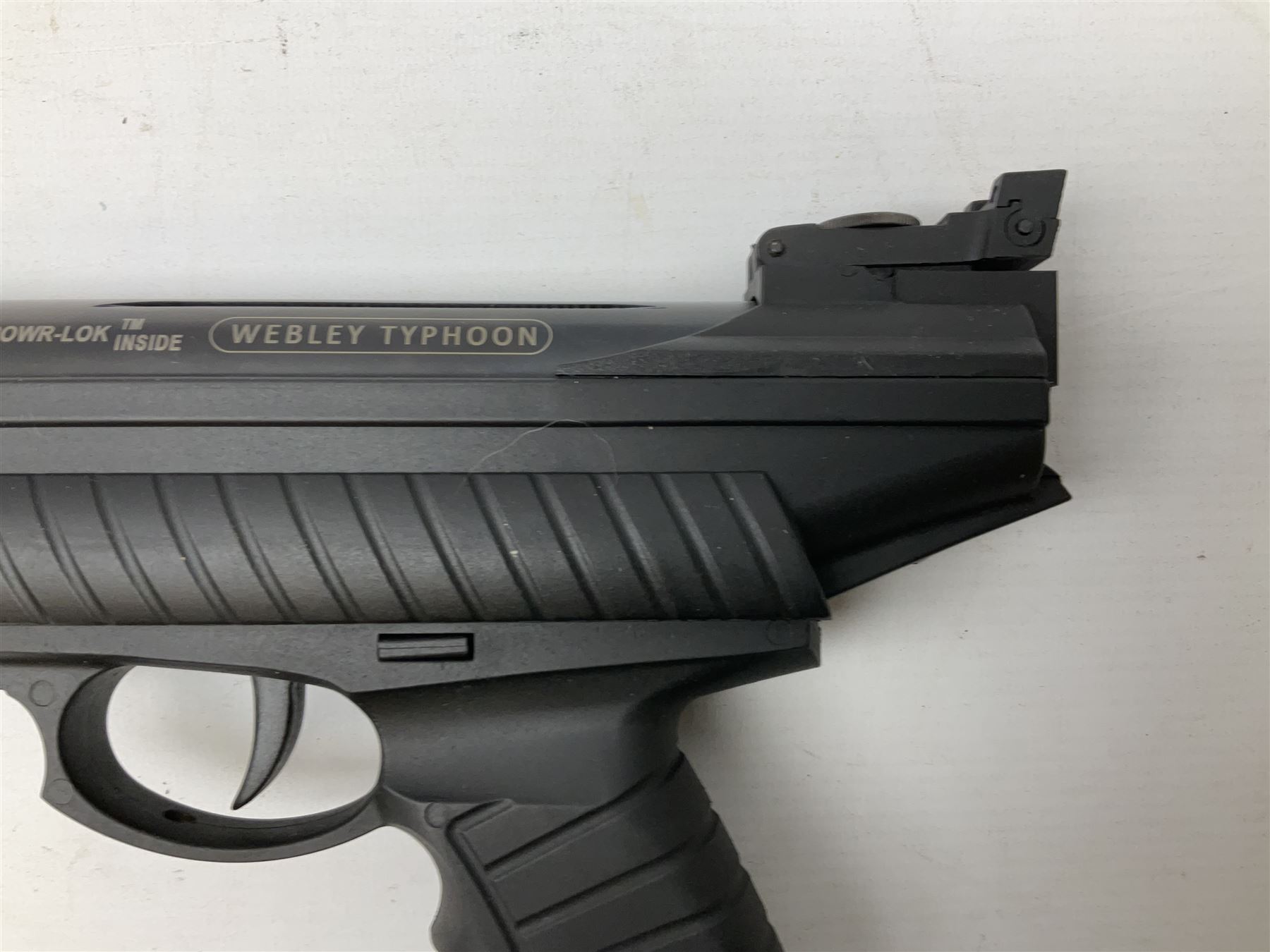 Webley Typhoon .22 air pistol, break barrel action with adjustable sight and sound moderator, serial no.1211 22509, in original box with instructions