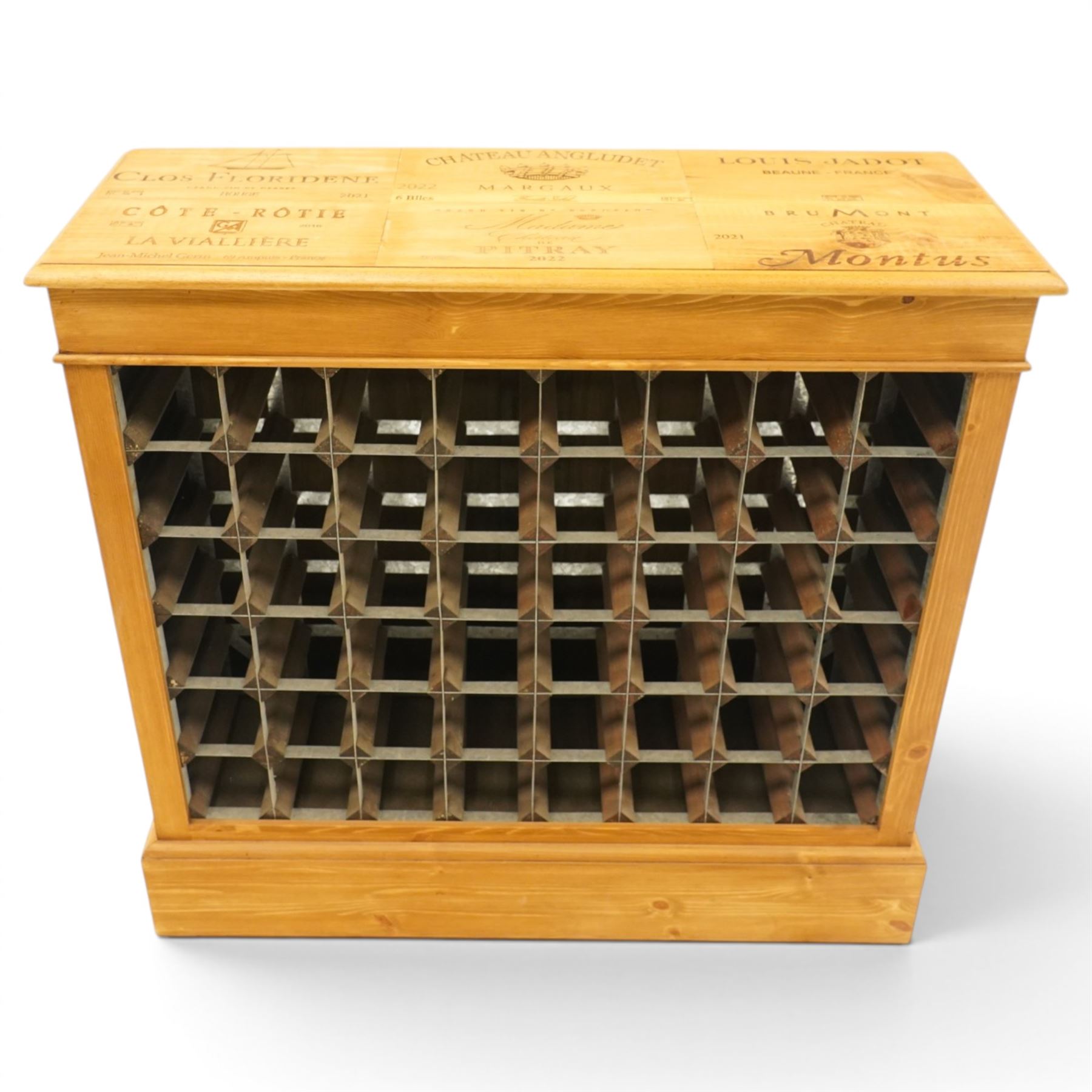 Traditional style pine wine rack, rectangular top with pyrography 'wine box' design, with apertures for fourty-eight bottles, on a plinth base