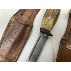 Eastern dagger with 14.5cm ornate fullered blade and nickel mounted horn grip; in nickel mounted ebonised wooden scabbard L25,5cm overall; another smaller Eastern dagger with animal head pommel and nickel mounted leather scabbard; three small sheathe knives with simulated antler grips; letter opener in the form of a German hunting knife with hoof grip; and Japanese wooden Floating Fish Knife with stainless steel blade (7)