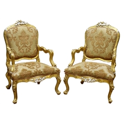  Pair French style giltwood open armchairs, moulded frames carved with acanthus and scrolls with silvered detail, brocade upholstered seats and backs on cabriole legs, H104cm (2)  