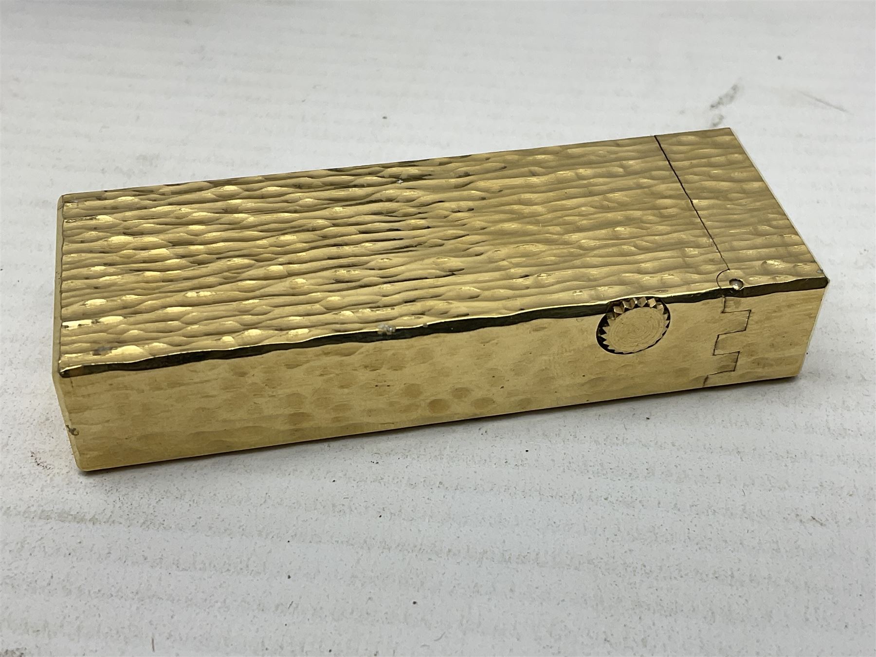 Dunhill gold plated lighter with textured bark effect decoration, in fitted case