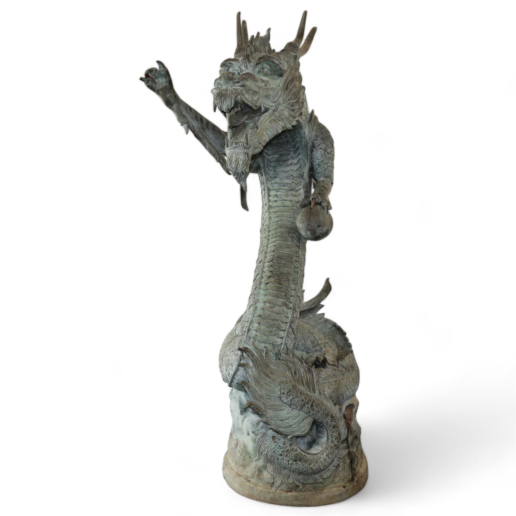 Verdigris hand finished cast brass Chinese Dragon garden centre-piece fountain, scaled dragon with gaping jaw holding an orb, curled tail on wave cast base