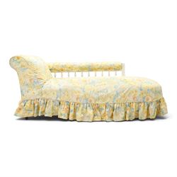 Victorian chaise longue in chintz upholstery, scrolled back with turned spindles up, raise...