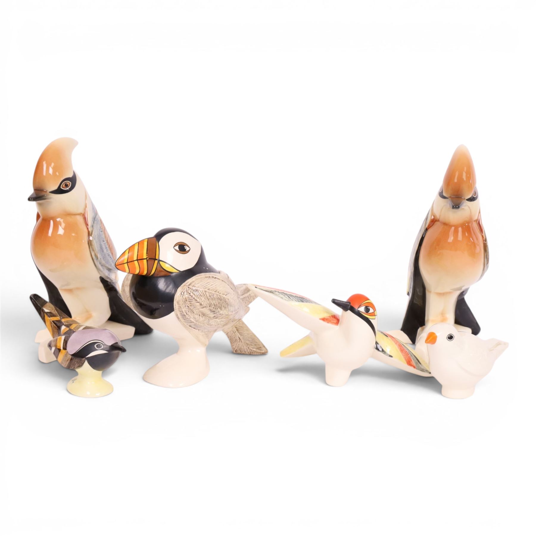 Collection of Goebel bird figures signed by designer George Selim, including two Jays, a Puffin and three others 