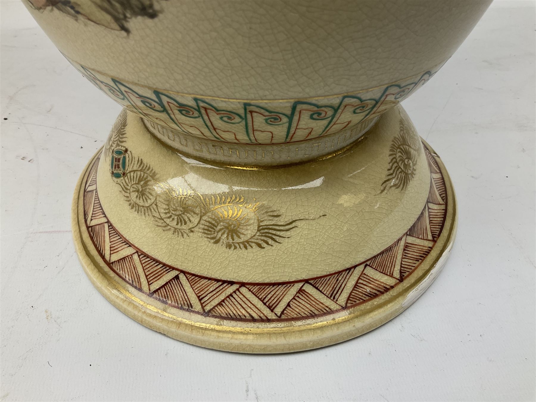 Pair early 20th Century Japanese floor vases of ovoid form, painted with warriors and elders within geometric designs and gilding, H61cm