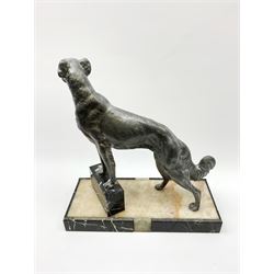 20th Century cast metal figure of a dog, on a marble edged base, H39cm