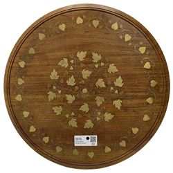 Small brass inlaid hardwood occasional table, the circular top inlaid with trailing foliate decoration, on turned folding base 