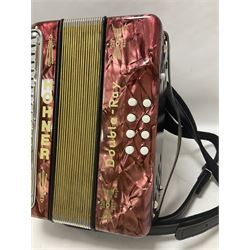 Hohner Double Ray black dot button melodeon in B/C; modern Irish style with eight bass and twenty-one treble buttons and double strap, with soft carrying case