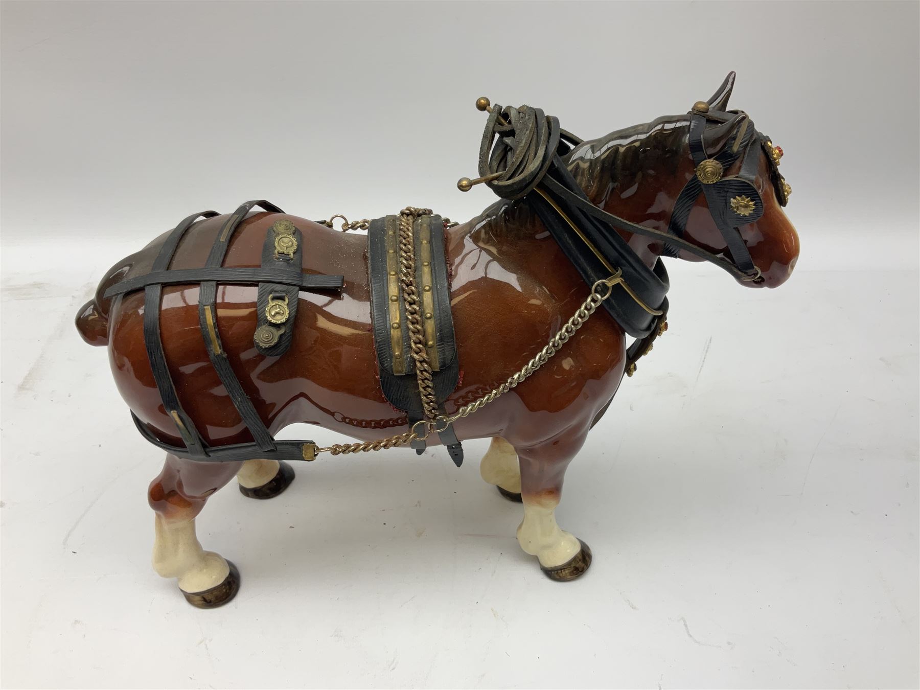 Four Melba Ware Shire horse figures and another similar, and three wood carts