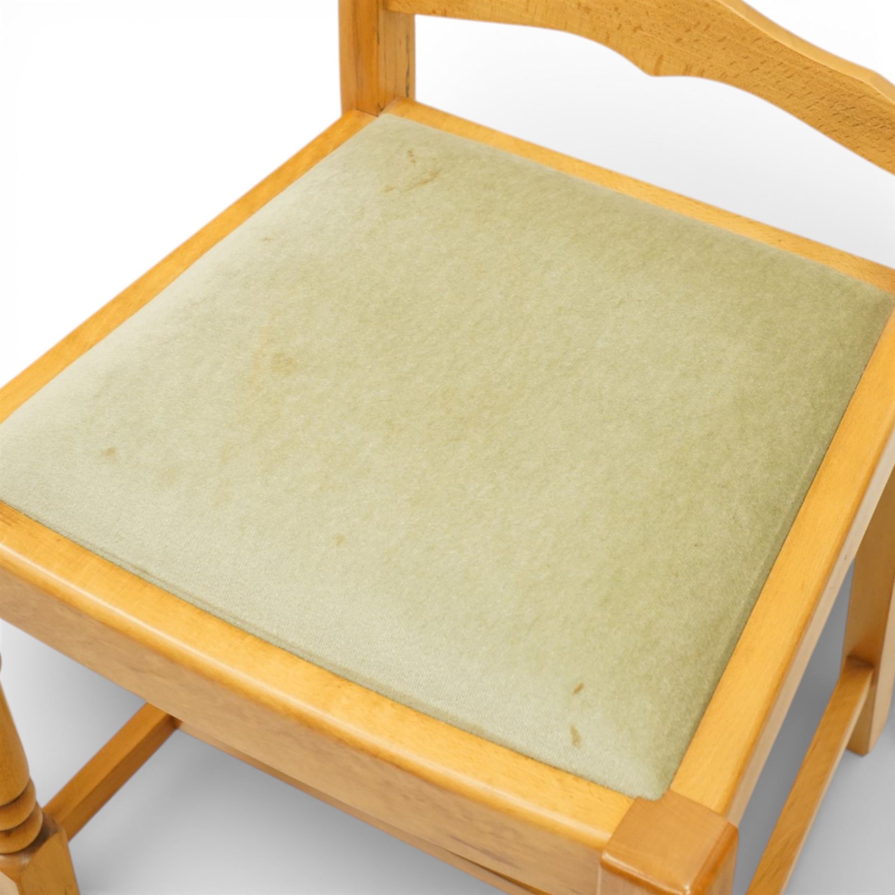 Wharfedale Traditional Furniture - oak dining table and eight ladder back chairs, circular top with stowable leaf forming a large an oval top extending to 167cm, on four splayed legs, together with eight ladder back chairs with green velour drop in seats