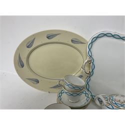 Victorian cabaret set,  comprising teapot, milk jug, covered sucrier, open sucrier, two cups and saucers upon a tray, together with Susie Cooper Hyde Park pattern coffee set, comprising coffee pot, four coffee cans and saucers, dessert plates and three plates in a similar design 