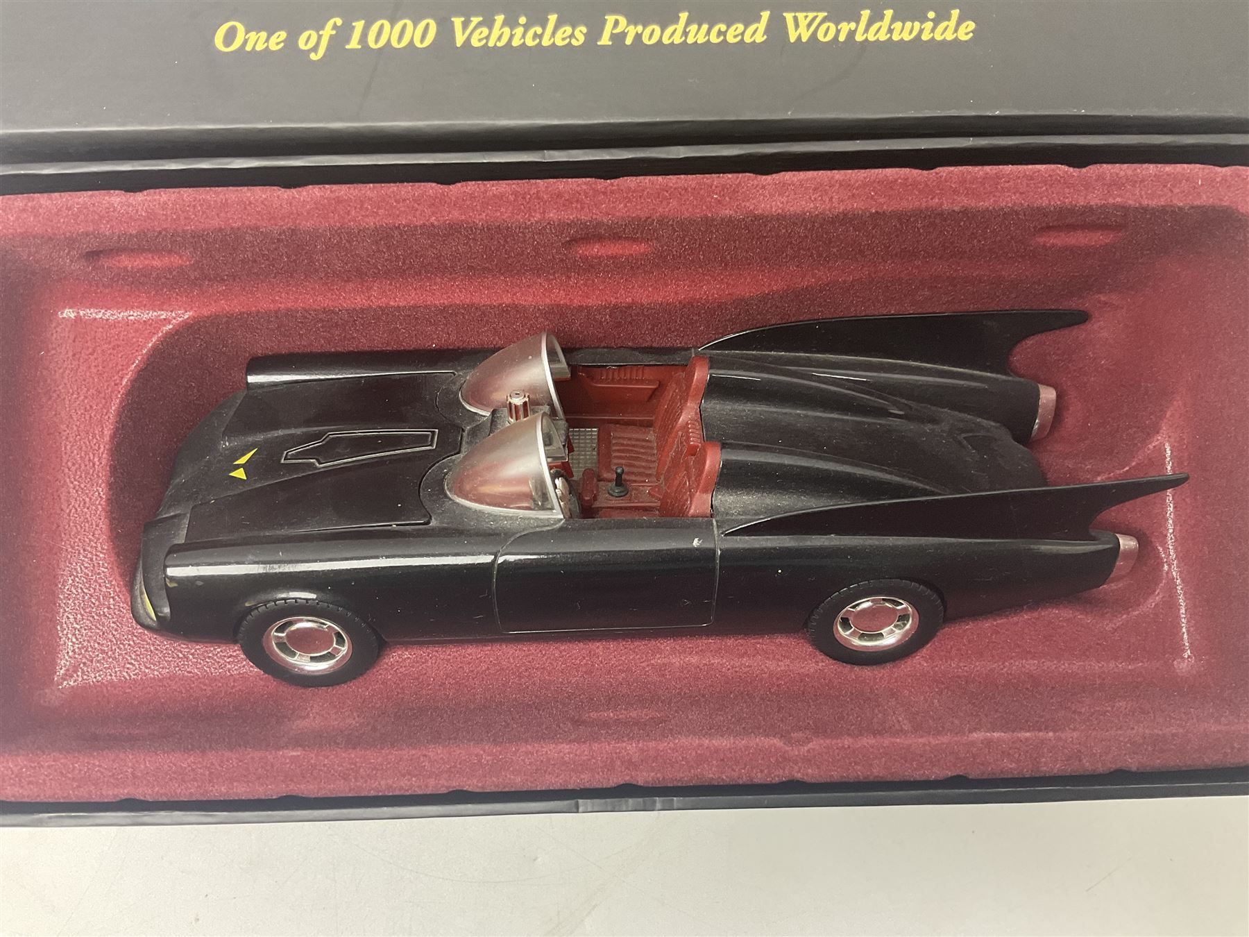 Two Corgi DC Comics die-cast Batmobiles comprising 1:18 scale die-cast Limited Edition Pre-Production Raw Metal Casting 1940 Batmobile Roadster no. 184/300, and 1:24 scale die-cast Limited Edition Raw Metal Casting 1960 Batmobile no. 858/1000, both with original boxes and certificates of authenticity 