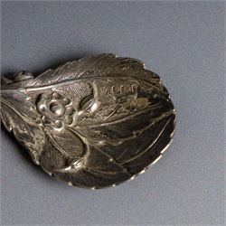 Late 20th century silver caddy spoon, naturalistically modelled with leaf shaped bowl, flowers and buds to centre, hallmarked Sheffield 1993, maker's mark indistinct