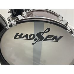 Rockburn eight-piece black drum kit with bass drum, floor tom and five other toms and snare drum; together with two other snare drums; Haosen bass drum; four cymbals; various stands, foot pedals, stool, tri-angle, drum sticks etc